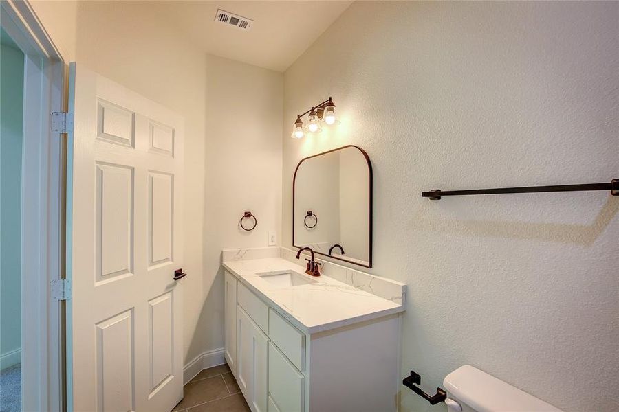 Bathroom with vanity and tile patterned floors Bathroom with vanity and tile patterned floors