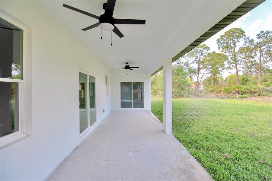 Exterior details and patio area of a home in , Sebring (Image 3).
