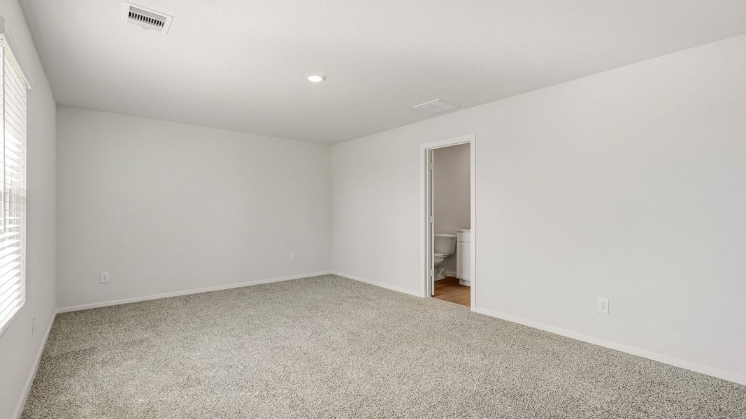 Spacious, unfurnished interior of a new home in Sunterra, Katy (Image 17).
