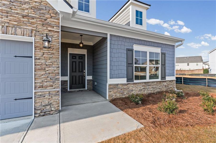 Exterior details and patio area of a home in Maple Village, Adairsville (Image 4).