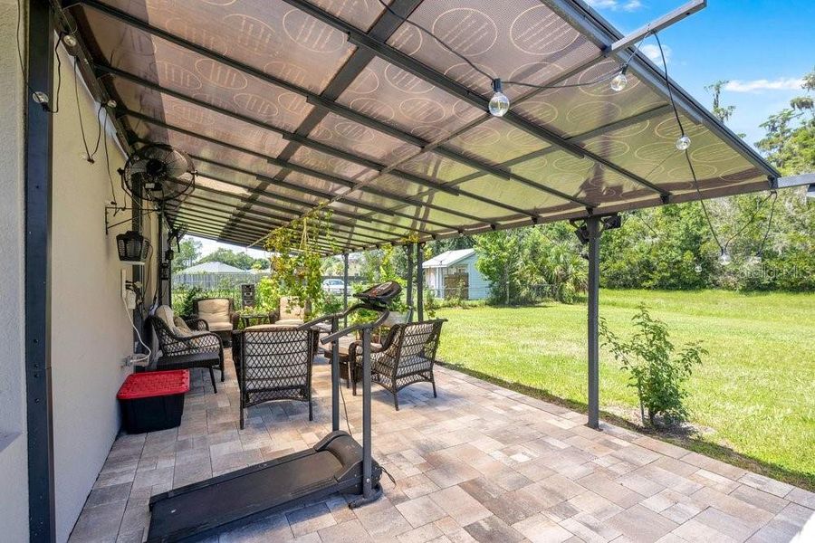 Exterior details and patio area of a home in Poinciana Enclave, Poinciana (Image 4).