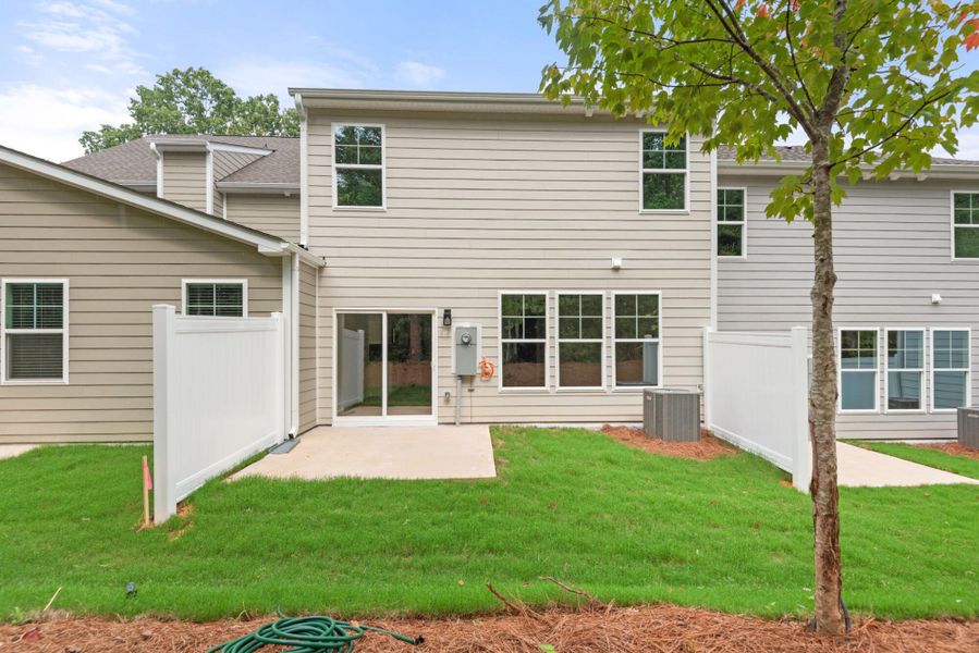 Exterior details and patio area of a home in Harbor Crossing, Greensboro (Image 18).