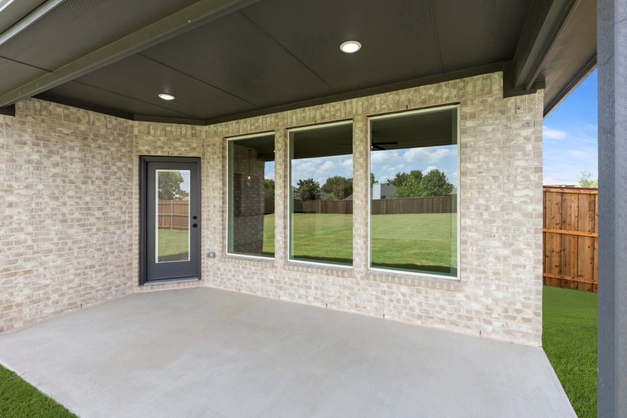 Exterior details and patio area of a home in Lovers Landing, Forney (Image 3).