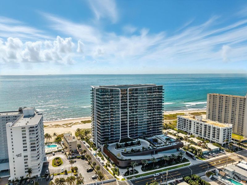 Front exterior of a new home in Casamar, Pompano Beach, FL, highlighting curb appeal (Image 2).