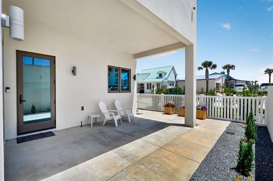 Exterior details and patio area of a home in , New Smyrna Beach (Image 33).