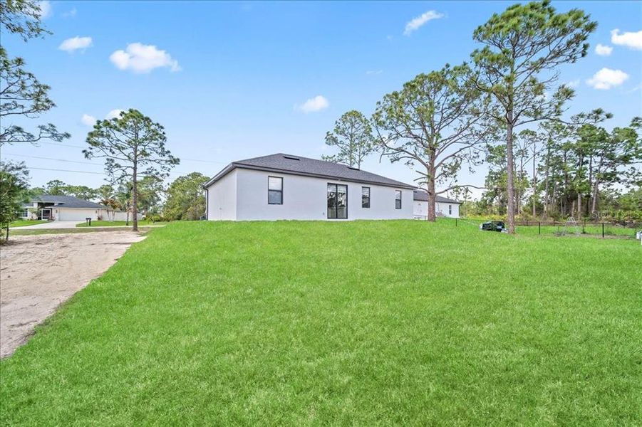 Exterior details and patio area of a home in , Lehigh Acres (Image 3).
