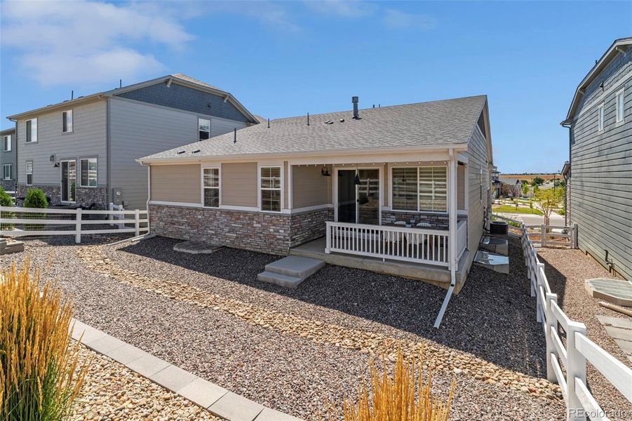 Front exterior of a new home in Murphy Creek, Aurora, CO, highlighting curb appeal (Image 1).
