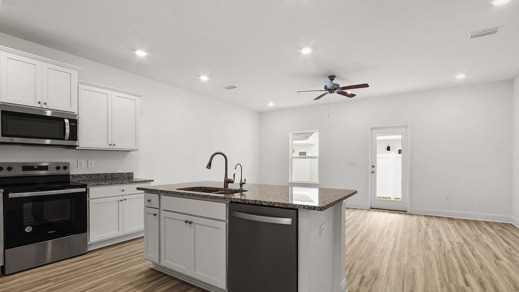 Furnished interior view inside a new home in Hawks Landing Townhomes, Santa Rosa Beach (Image 7).