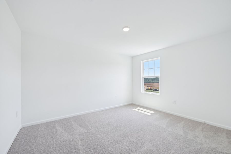 Representative unfurnished interior of a home built from the Meadow by Ashton Woods in Middleton Farms, Middlesex (Image 22).