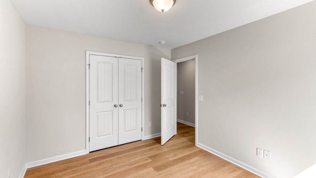 Representative unfurnished interior of a home built from the The Holly by Smith Family Homes in Lakeview Pines, Statesboro (Image 20).