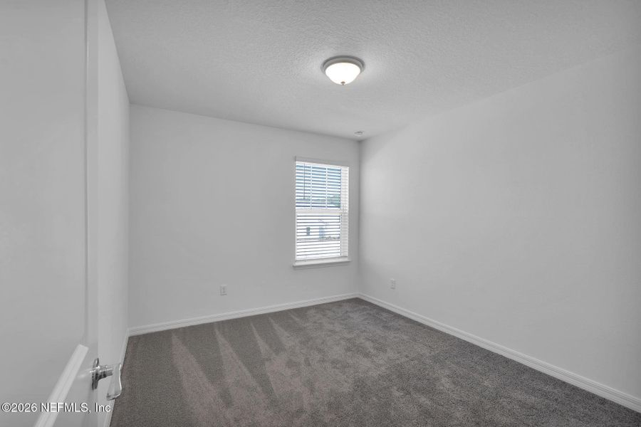 Spacious, unfurnished interior of a new home in Wells Landing, Jacksonville (Image 28).