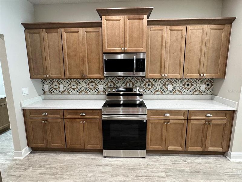 Furnished interior view inside a new home in , Dade City (Image 38).