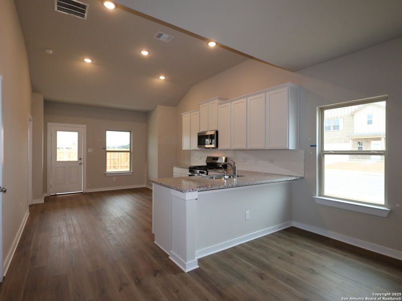 Furnished interior view inside a new home in Winding Brook, San Antonio (Image 6).