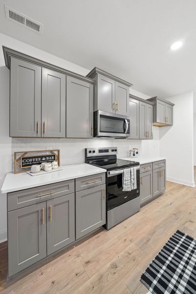 Furnished interior view inside a new home in New Hope Estates, Clarksville (Image 4).