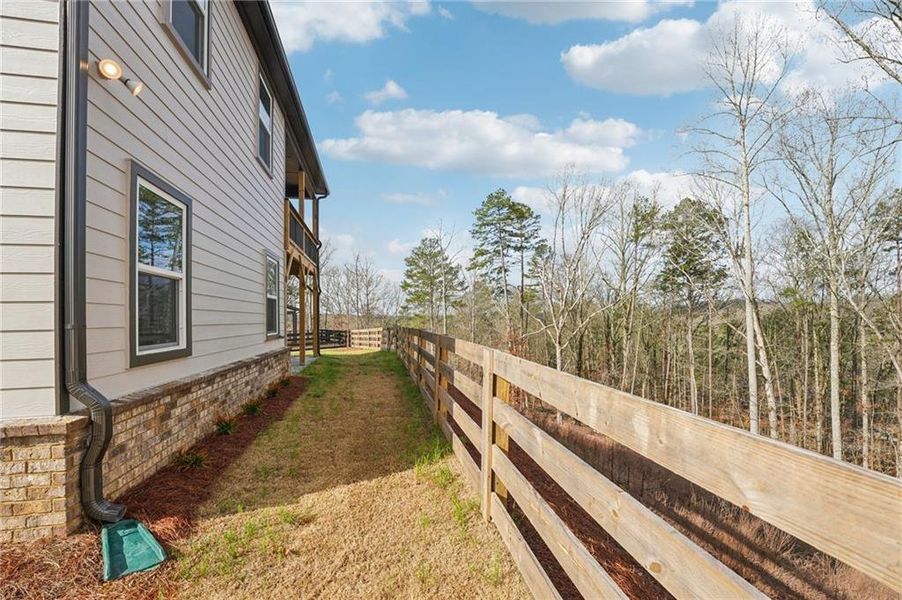 Exterior details and patio area of a home in Tiberon Woods, Cumming (Image 37). Exterior details and patio area of a home in Tiberon Woods, Cumming (Image 37).