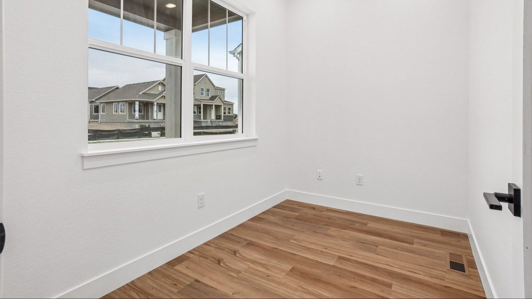 Furnished interior view inside a new home in Dillon Pointe - Journey, Broomfield (Image 33).