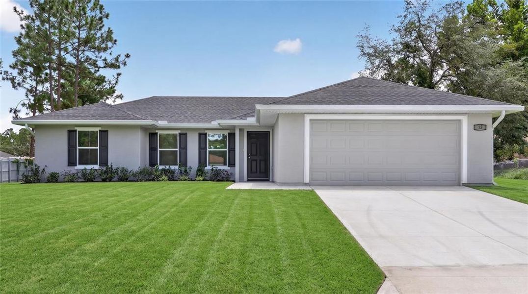 Front exterior of a new home in , Ocala, FL, highlighting curb appeal (Image 2).