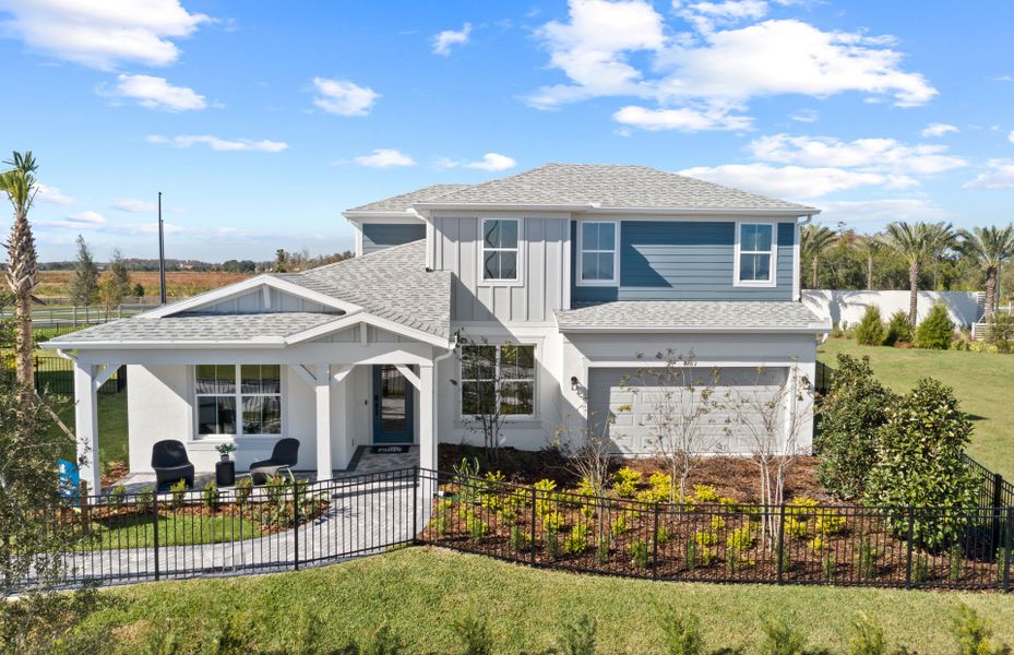 Representative exterior photo of a completed home built from the Mahogany Grand by Pulte Homes in EverBe, Orlando, FL (Image 17). Representative exterior photo of a completed home built from the Mahogany Grand by Pulte Homes in EverBe, Orlando, FL (Image 17).