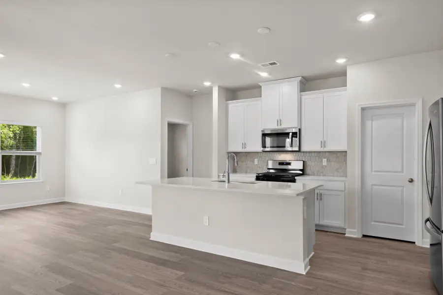 Furnished interior view inside a new home in Cypress Ridge - The Coastline Series, Longs (Image 4).
