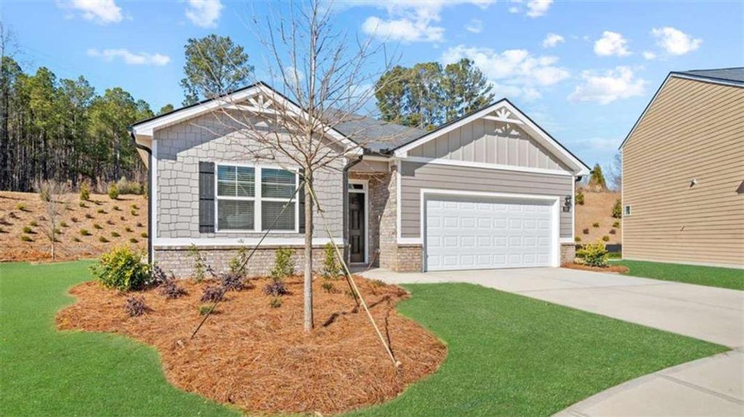 Front exterior of a new home in Poplar Preserve, Newnan, GA, highlighting curb appeal (Image 2).