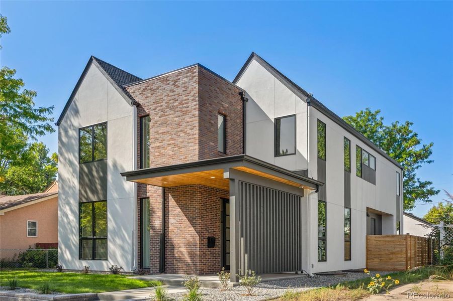 Front exterior of a new home in , Denver, CO, highlighting curb appeal (Image 28).