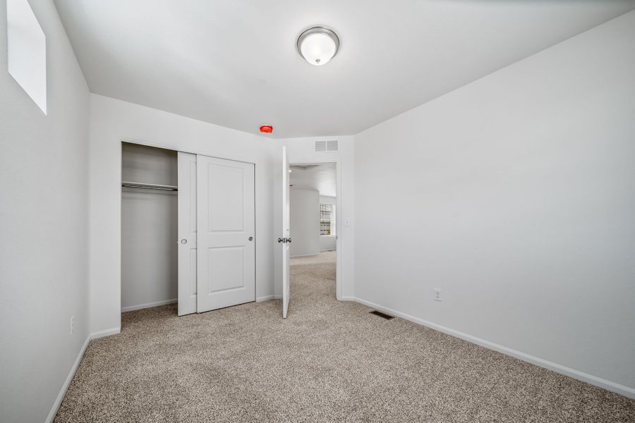 Spacious, unfurnished interior of a new home in Reunion, Commerce City (Image 17).