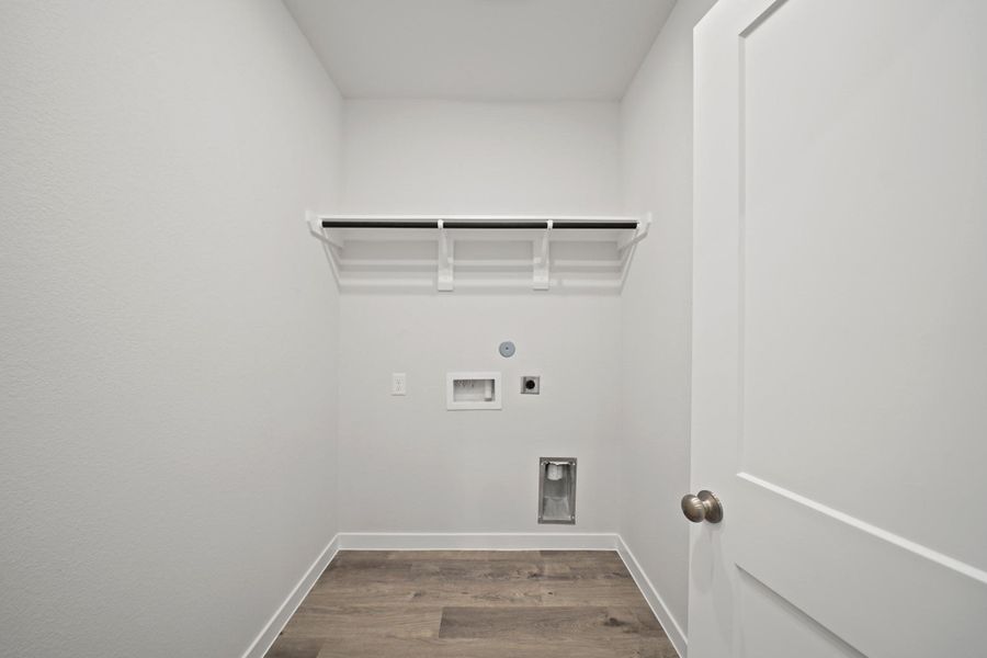 Furnished interior view inside a new home in Sunterra, Katy (Image 4).