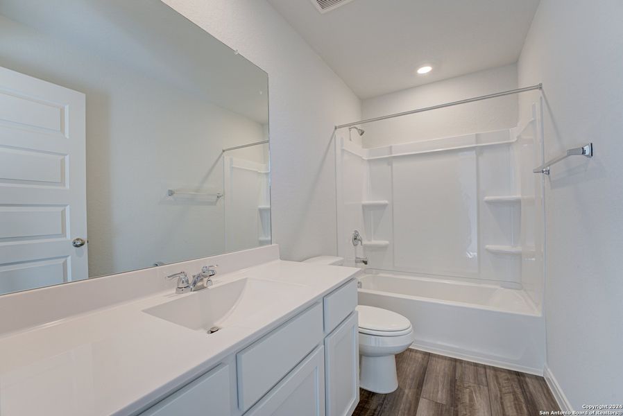 Furnished interior view inside a new home in Blue Ridge Ranch, San Antonio (Image 9).