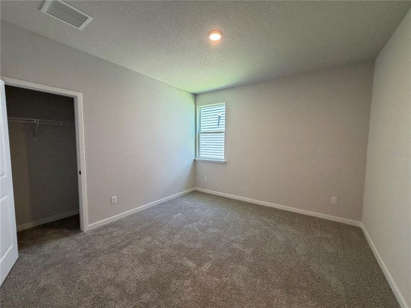 Spacious, unfurnished interior of a new home in Reserve East, Flagler Beach (Image 31).