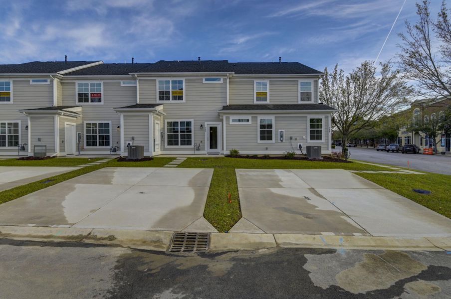 Front exterior of a new home in Lake Carolina Townhomes, Columbia, SC, highlighting curb appeal (Image 24).