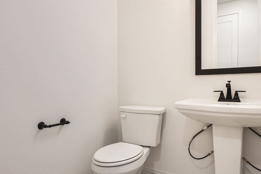 Plan 1691 secondary bathroom representative photo