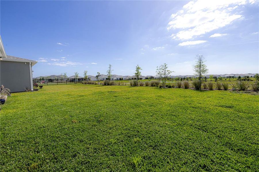 Exterior details and patio area of a home in EverBe, Orlando (Image 3).
