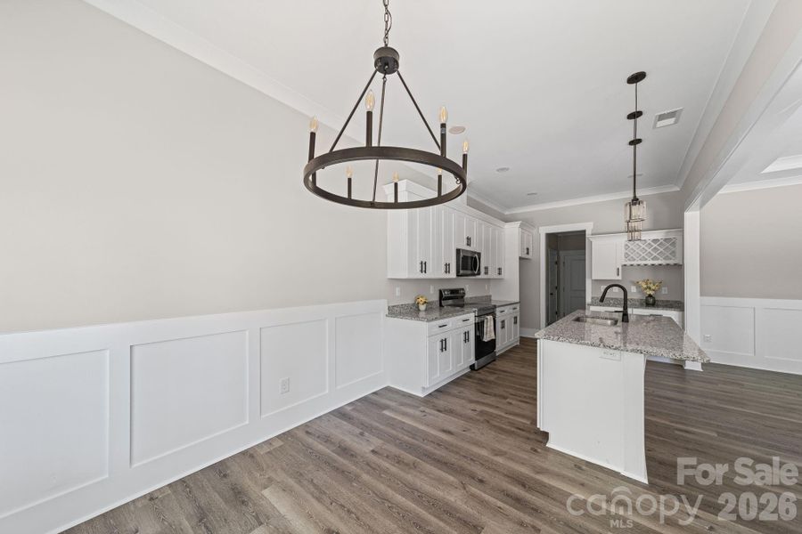 Furnished interior view inside a new home in , Matthews (Image 11).