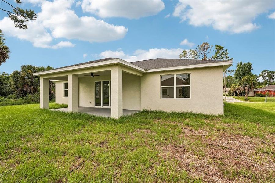 Exterior details and patio area of a home in , North Port (Image 24).