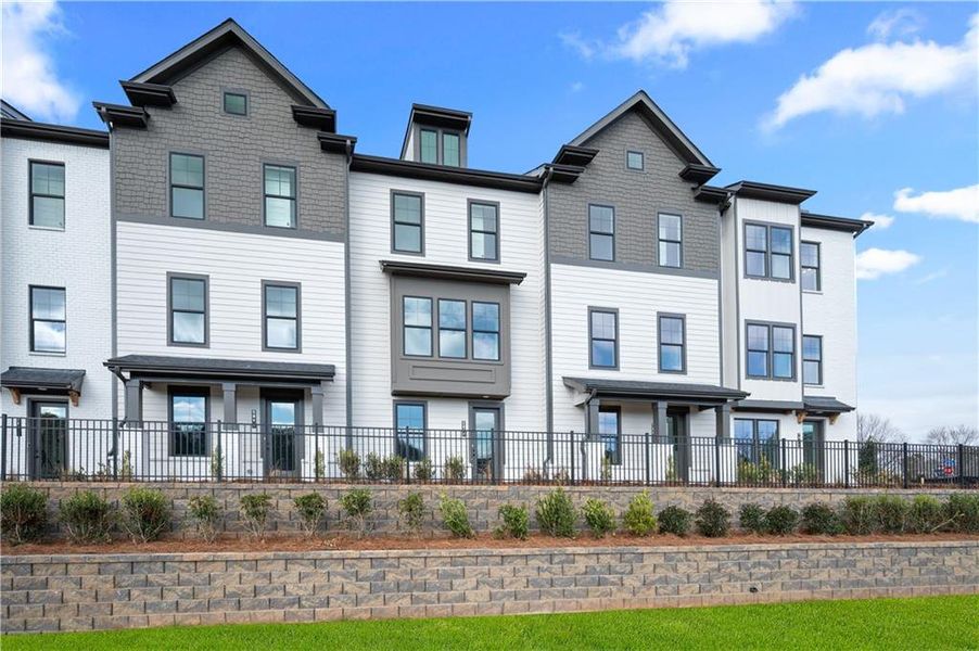 Front exterior of a new home in Barrett Pointe, Kennesaw, GA, highlighting curb appeal (Image 18).
