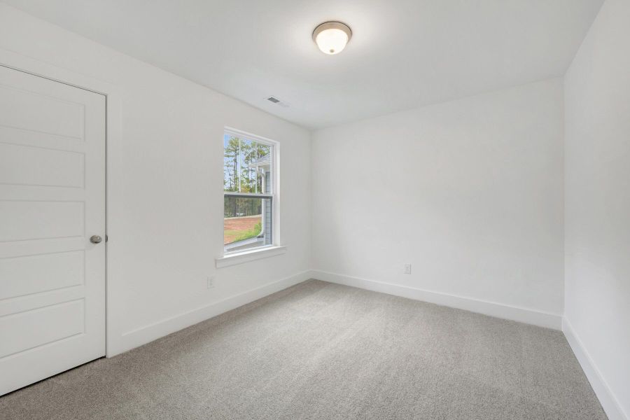 Spacious, unfurnished interior of a new home in Ashmore Townes, Garner (Image 11).