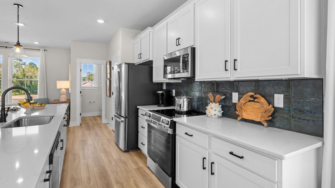 Representative furnished interior of a home built from the Brookgreen by DRB Homes in Seabreeze Crossing, Little River (Image 16).