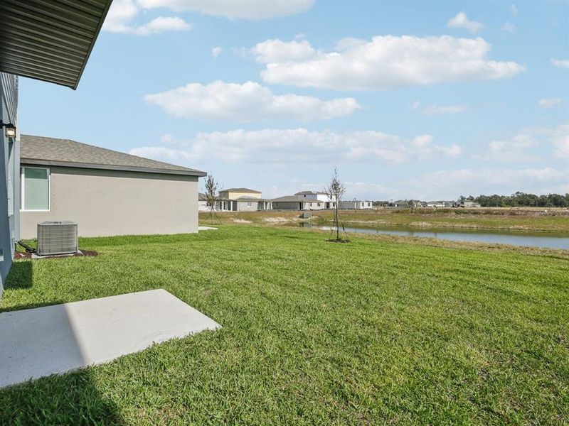 Exterior details and patio area of a home in Oakfield Trails - Premier Series, Parrish (Image 3).