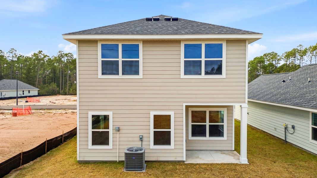 Exterior details and patio area of a home in Chateau Nemours, Port Saint Joe (Image 3). Exterior details and patio area of a home in Chateau Nemours, Port Saint Joe (Image 3).