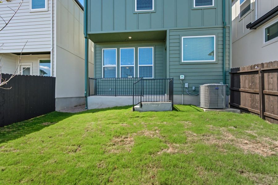 Exterior details and patio area of a home in Centero at Stone Oak, San Antonio (Image 22).