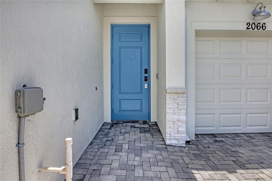 Exterior details and patio area of a home in The Timbers at Everlands, Palm Bay (Image 24).