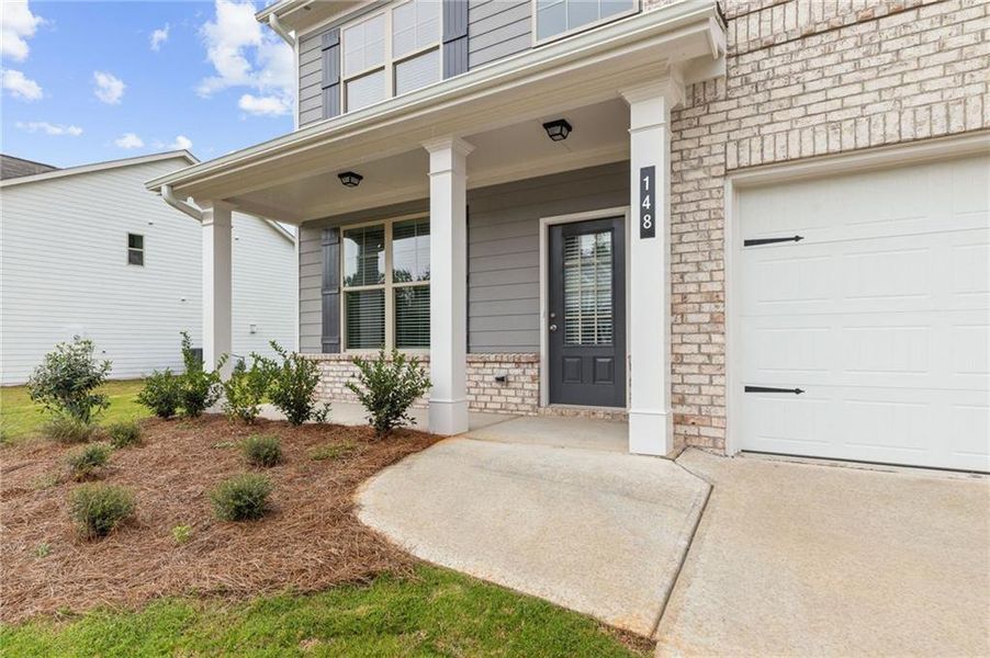 Exterior details and patio area of a home in Hellen Valley, Braselton (Image 3).