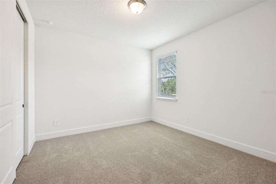 Spacious, unfurnished interior of a new home in Ridgehaven - Signature Series, Ormond Beach (Image 56).