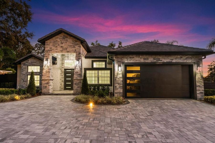 Front exterior of a new home in , Clermont, FL, highlighting curb appeal (Image 1). Front exterior of a new home in , Clermont, FL, highlighting curb appeal (Image 1).