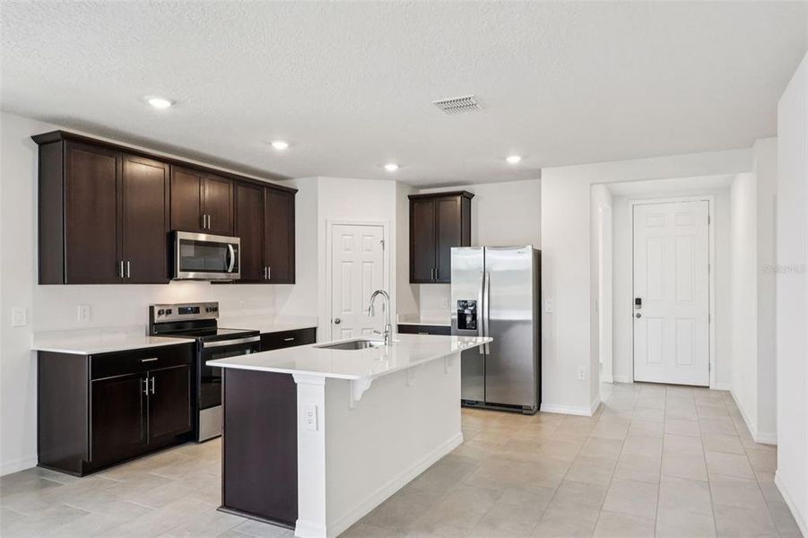 Furnished interior view inside a new home in The Meadow at Crossprairie, St. Cloud (Image 7). Furnished interior view inside a new home in The Meadow at Crossprairie, St. Cloud (Image 7).