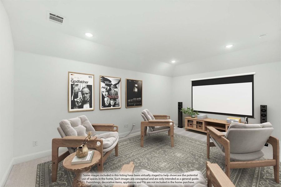 Media room with projection screen, four chairs, movie posters, and a wood entertainment console on carpet