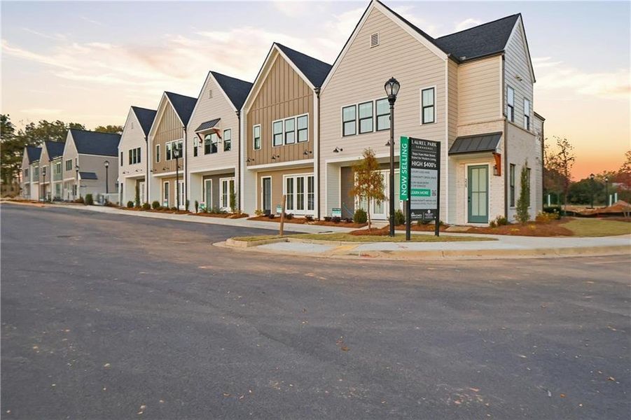 Front exterior of a new home in , Braselton, GA, highlighting curb appeal (Image 23).