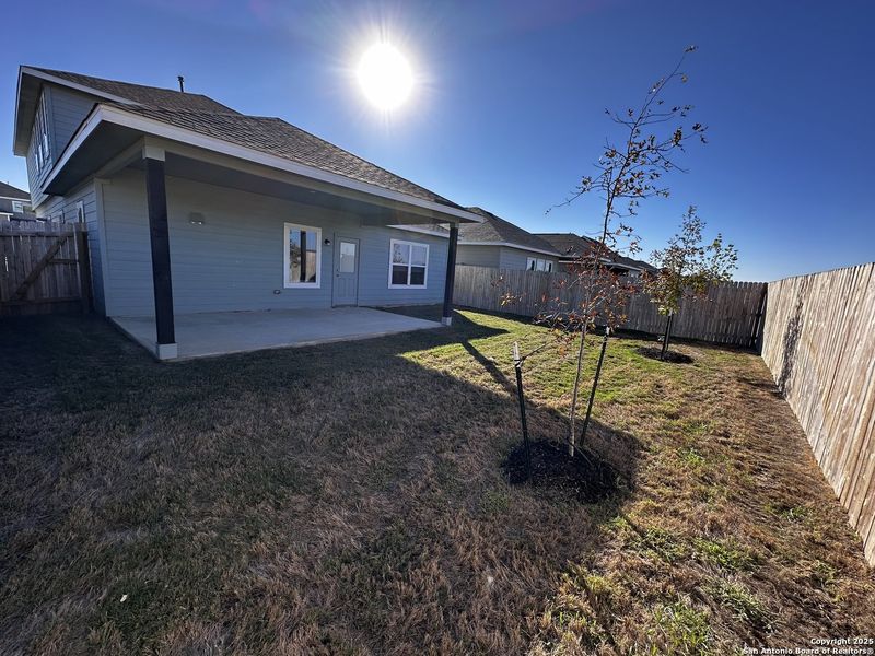 Exterior details and patio area of a home in Hennersby Hollow, San Antonio (Image 3).