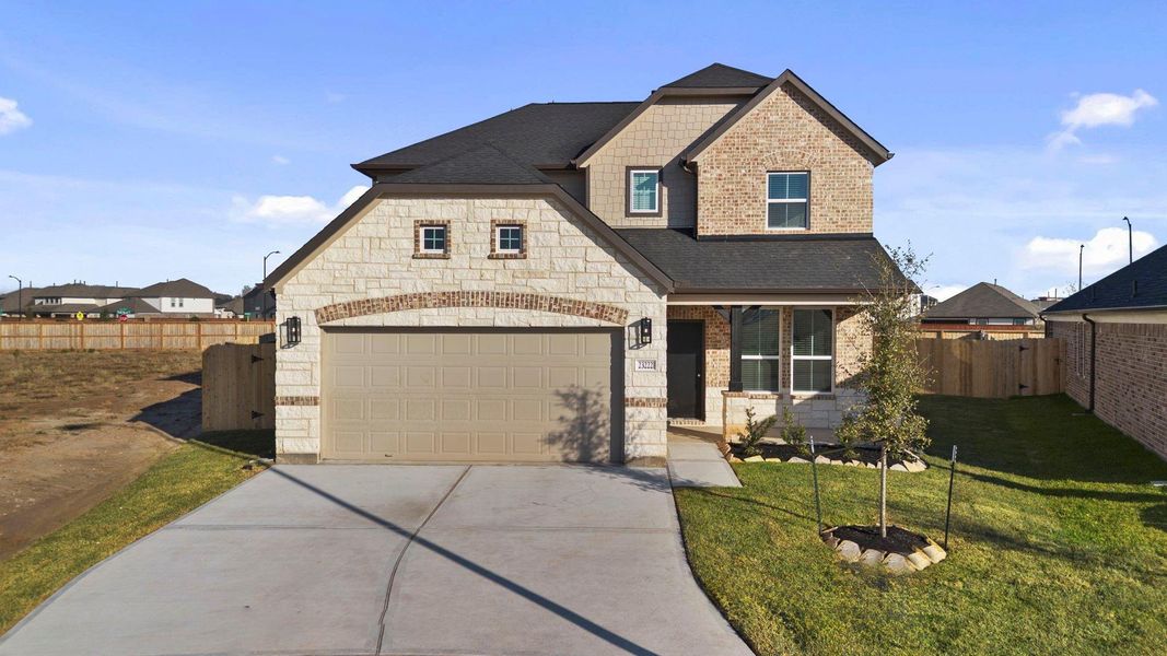 Front exterior of a new home in Morton Creek Ranch, Katy, TX, highlighting curb appeal (Image 14).