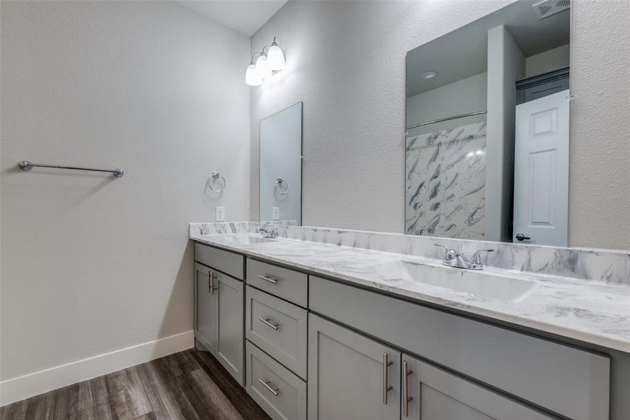 Similar home: Primary Bathroom featuring double vanity